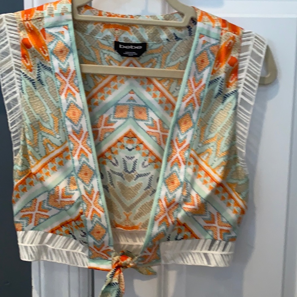 Bebe silk feel colorful vest never worn gorgeous and Aztec in style